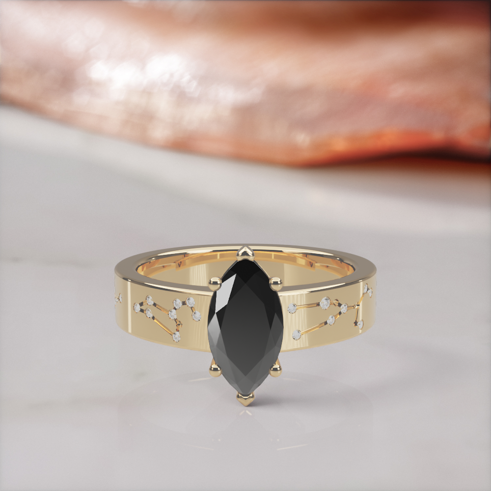 Constellation engagement ring in yellow gold with a natural black marquise diamond and white constellation diamonds, front view lying flat