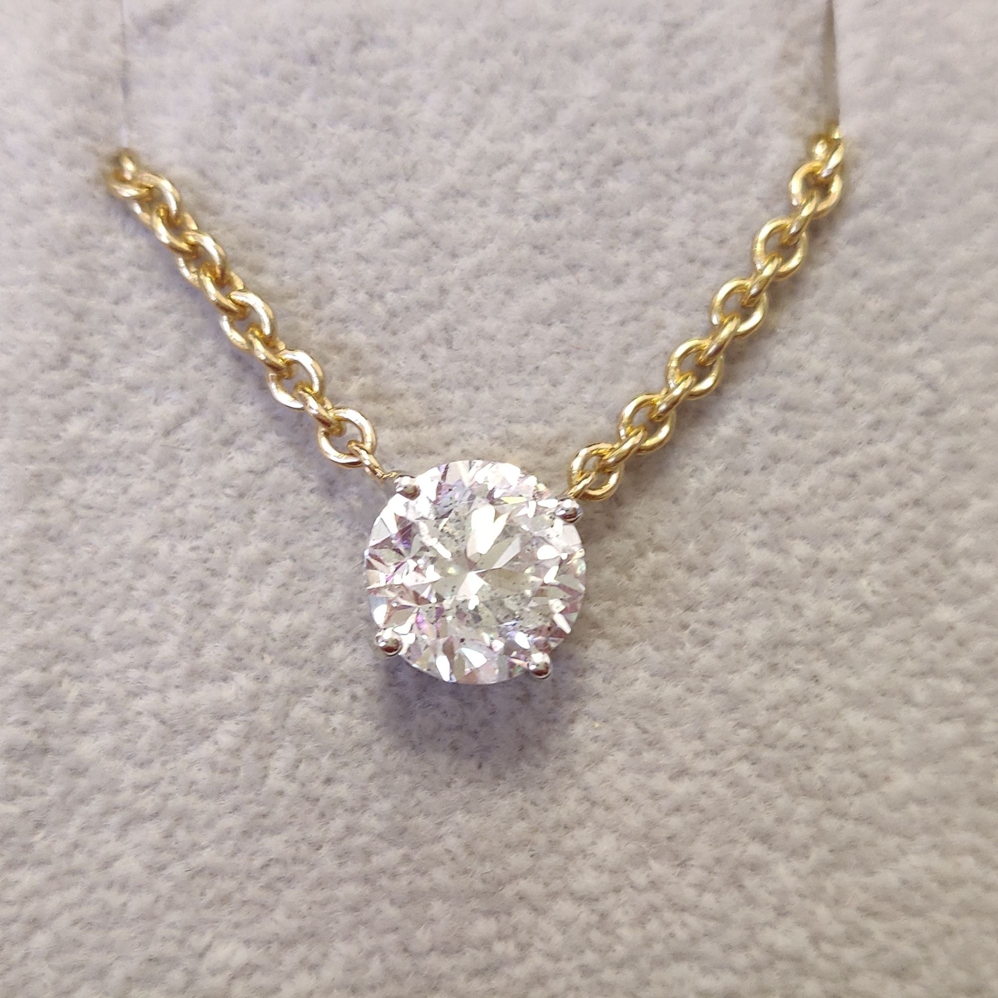 Floating 1.5 Carat Natural Diamond Solitaire Pendant with a Yellow Necklace