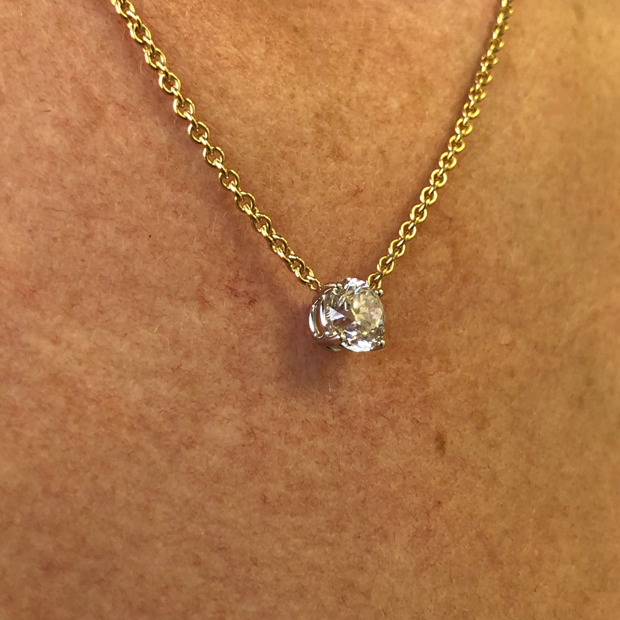 Floating 1.5 Carat Natural Diamond Solitaire Pendant with a Yellow Necklace