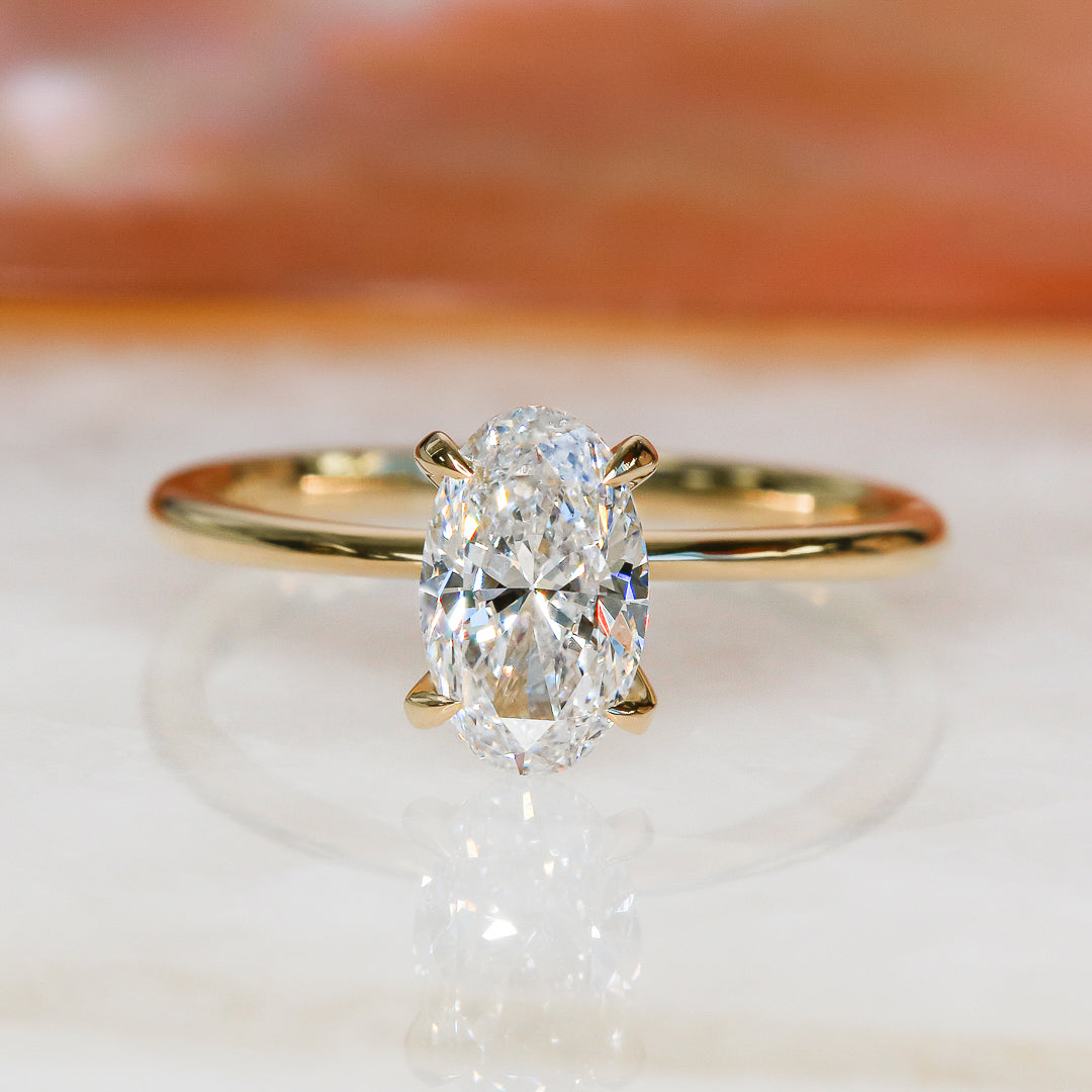 1 Carat Claw Prongs Natural Oval Cut Diamond Engagement Ring