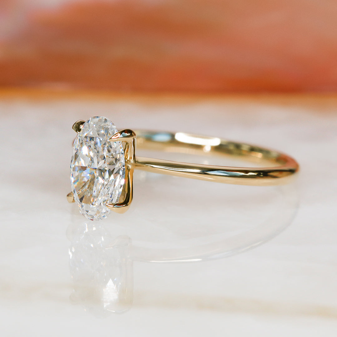 1 Carat Claw Prongs Natural Oval Cut Diamond Engagement Ring