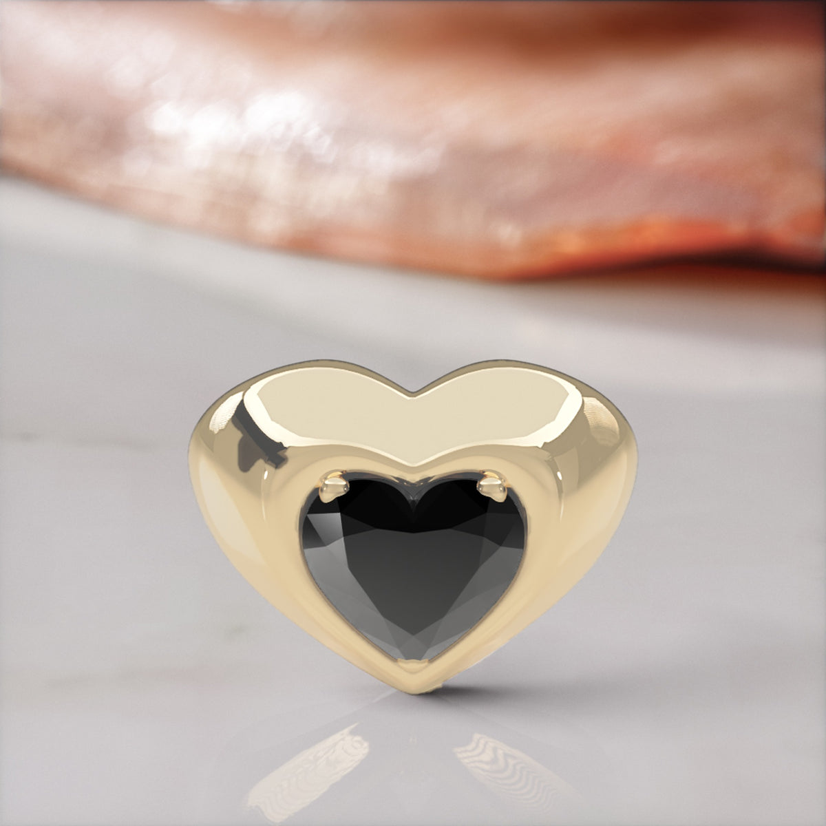 Cor Caroli heart shaped natural black diamond bezel ring in yellow gold, front view