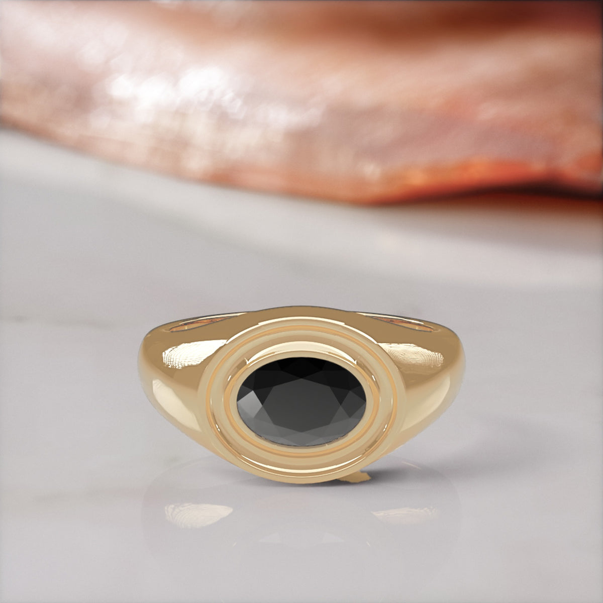 Algol east-west oval natural black diamond bezel ring in yellow gold, front view