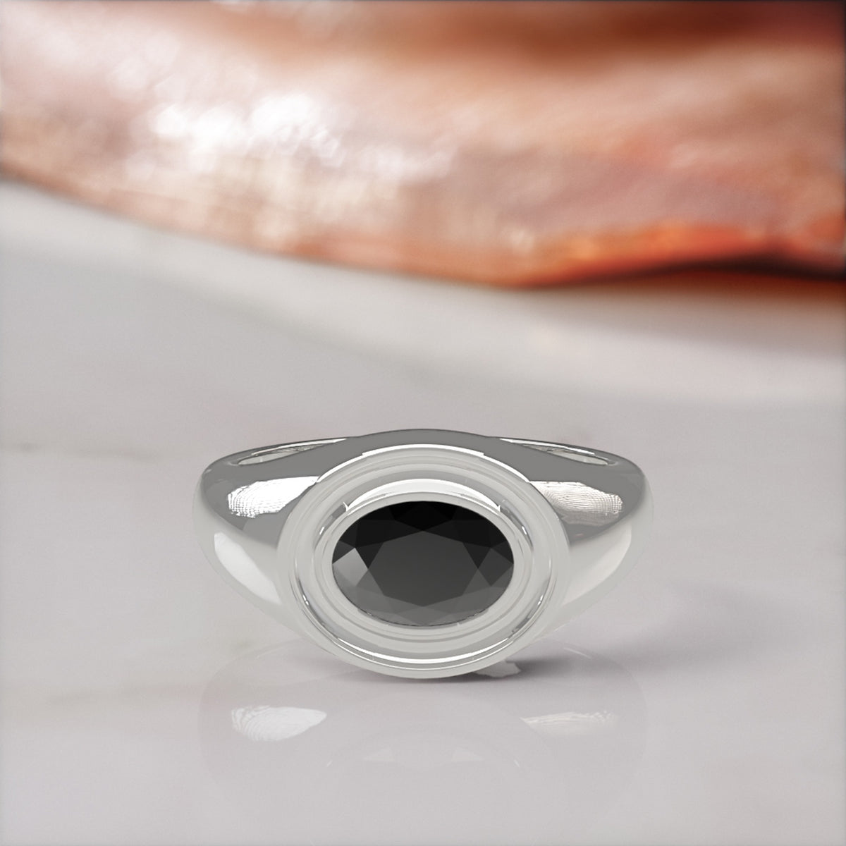Algol east-west oval natural black diamond bezel ring in white gold, front view