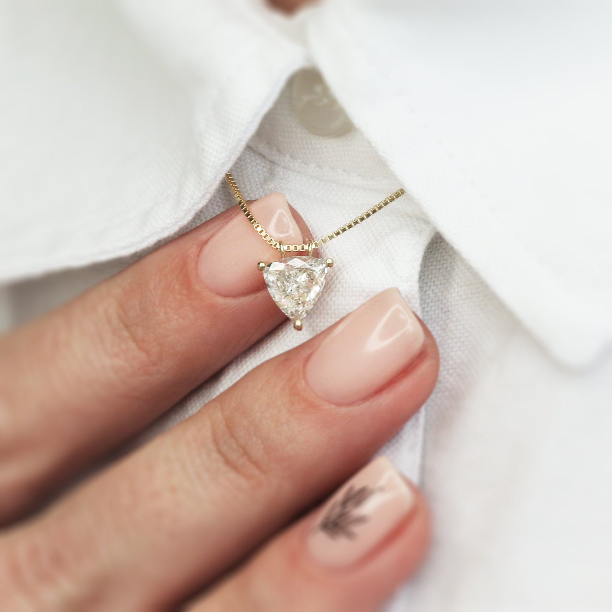 Natural Diamond Solitaire Pendant with a Yellow Gold Necklace