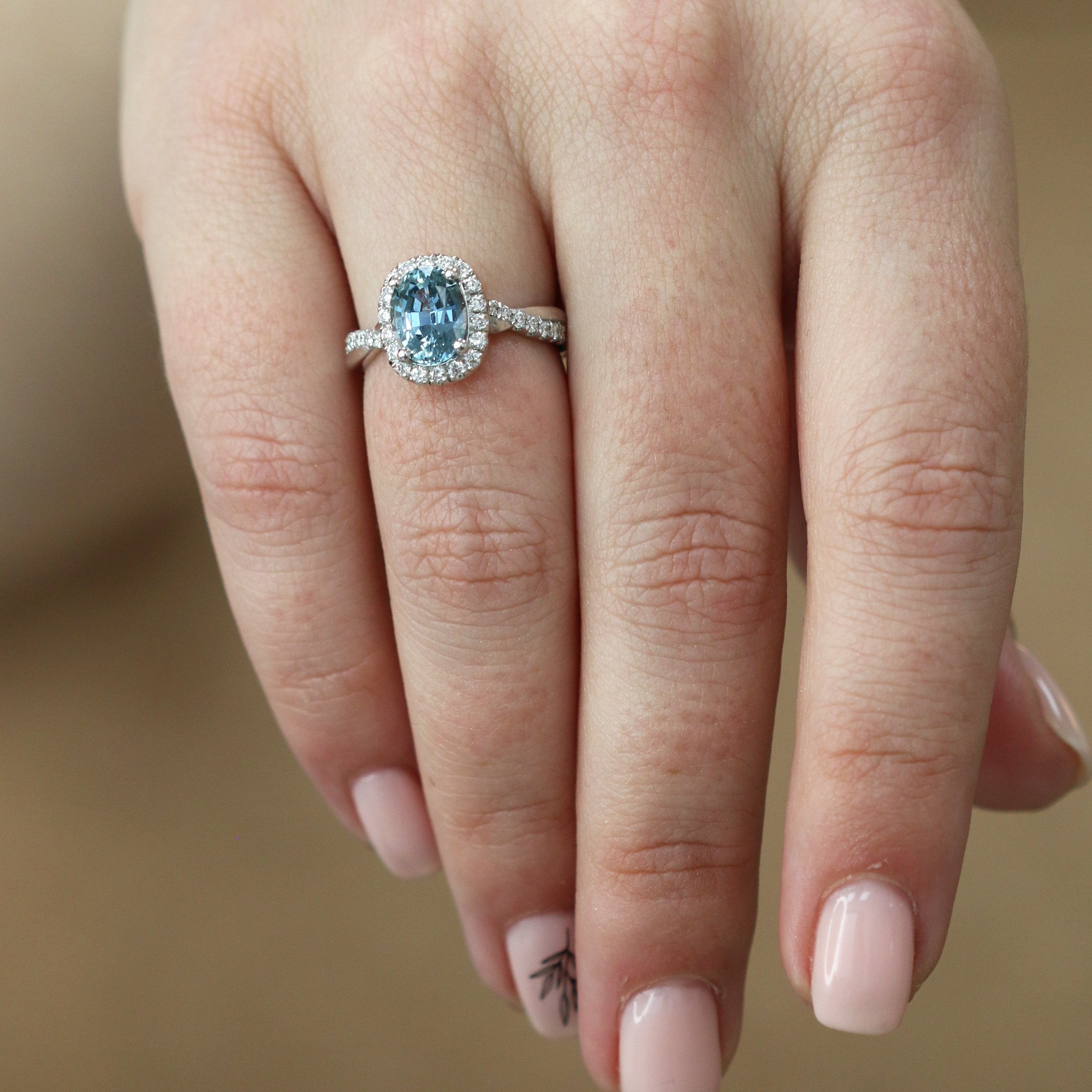 Translucent - Decorative shank Natural Oval Sapphire Engagement Ring