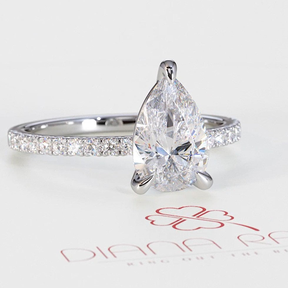 3 prongs Natural Pear cut Diamond Engagement Ring