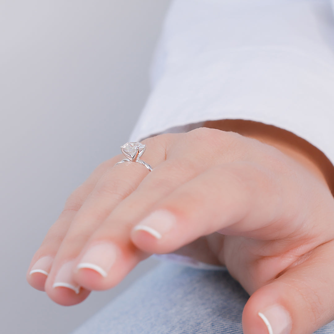 Twisted Shank Natural Round Cut Diamond Engagement Ring