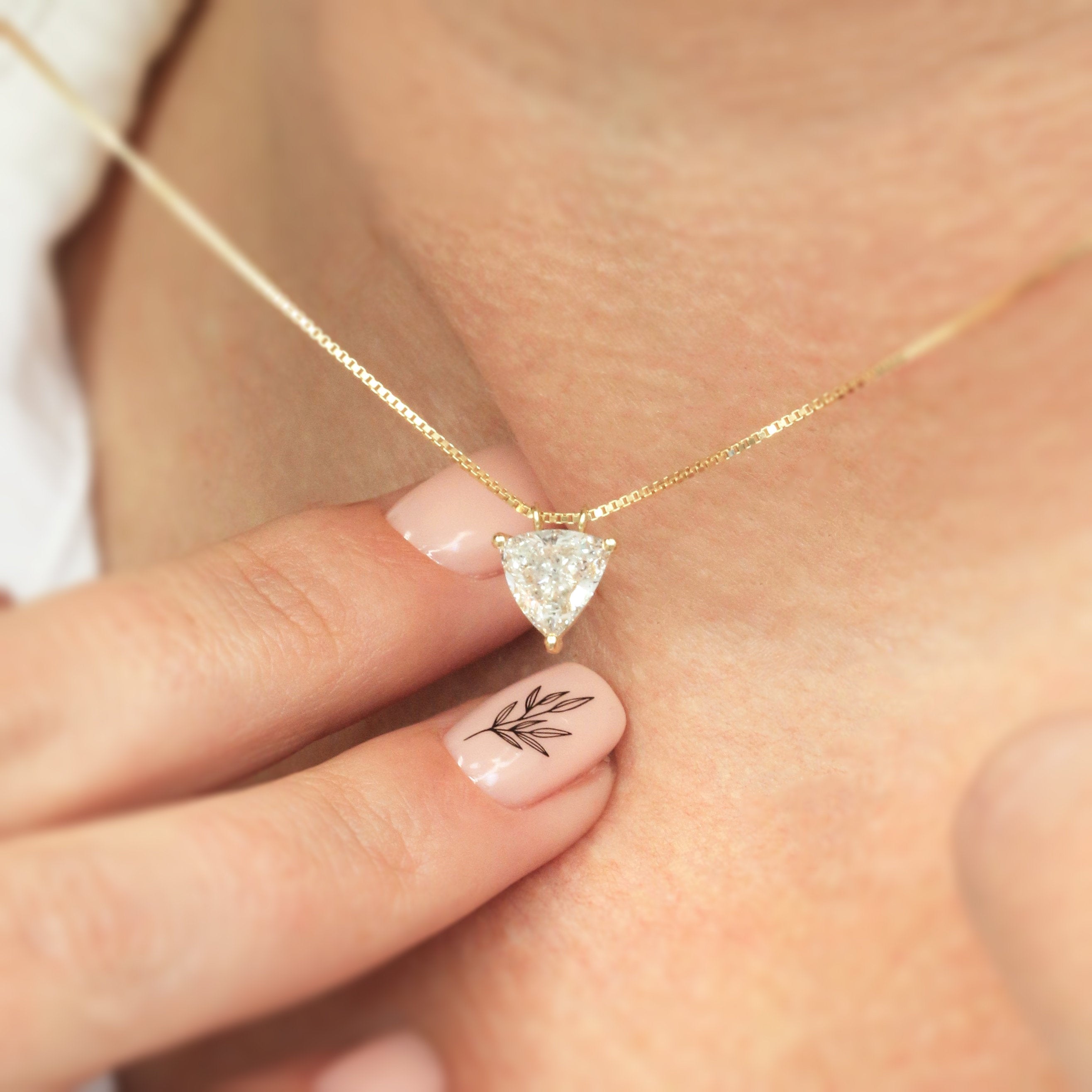 Natural Diamond Solitaire Pendant with a Yellow Gold Necklace