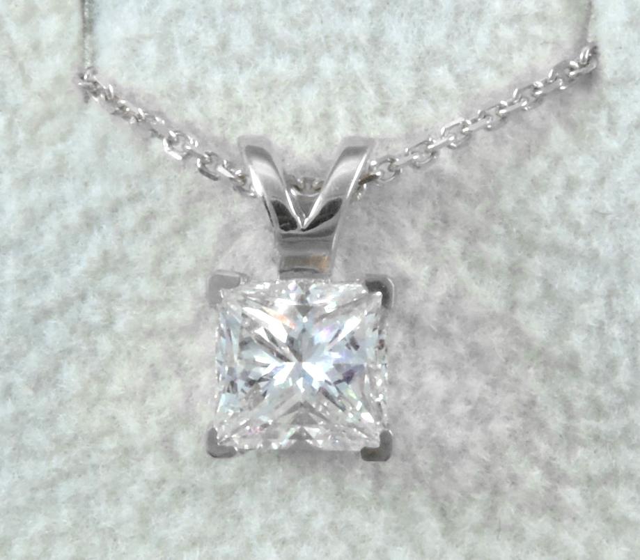 Coronas Natural Diamond Solitaire Pendant with a White Gold Necklace