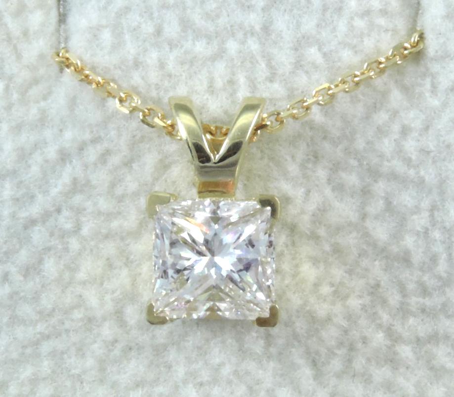 Natural Diamond Solitaire Pendant with a Yellow Gold Necklace