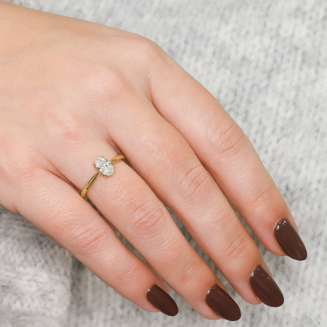 Descending Natural Oval  Diamond Engagement Ring