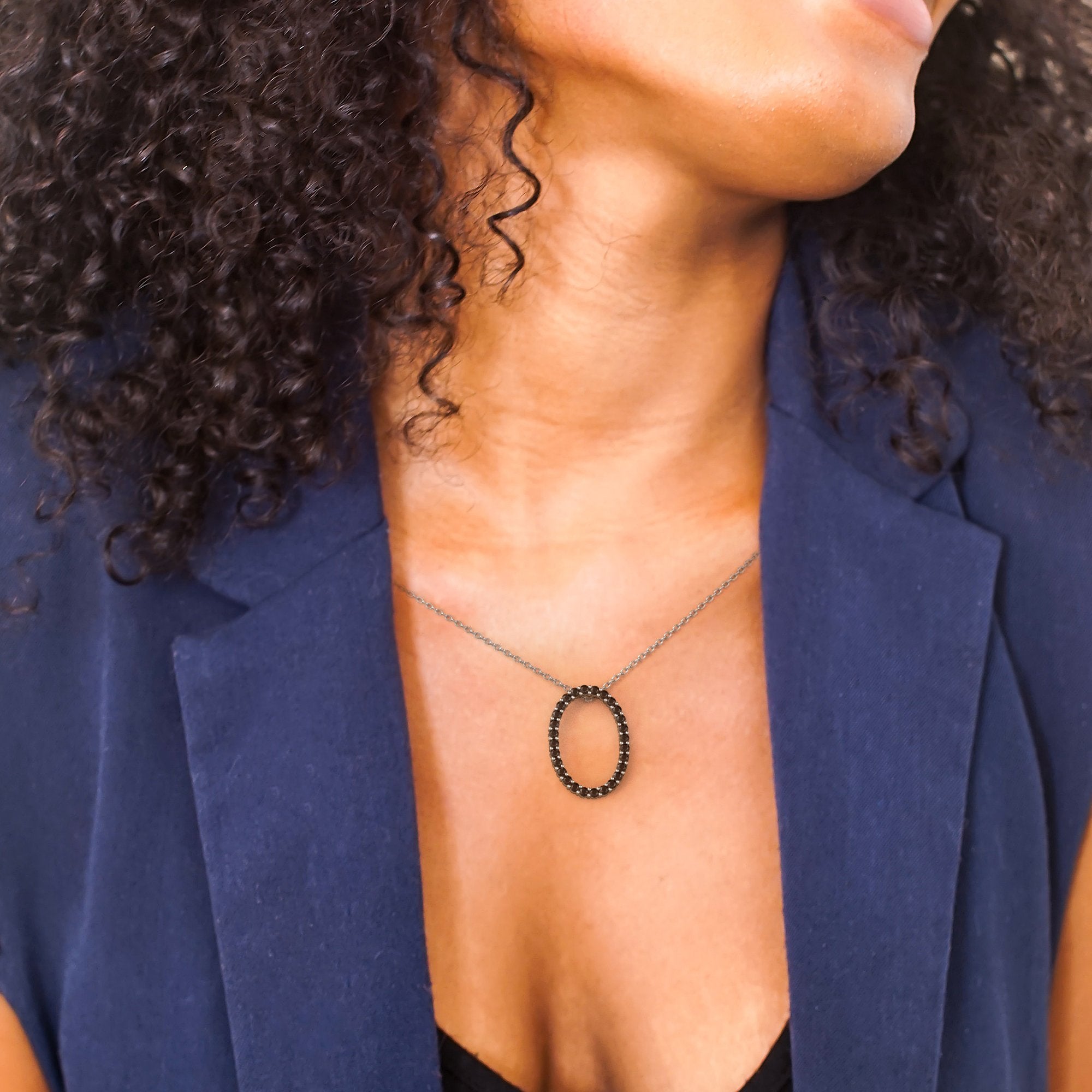 Oval Natural Black Diamond Alternative Pendant with a White Necklace