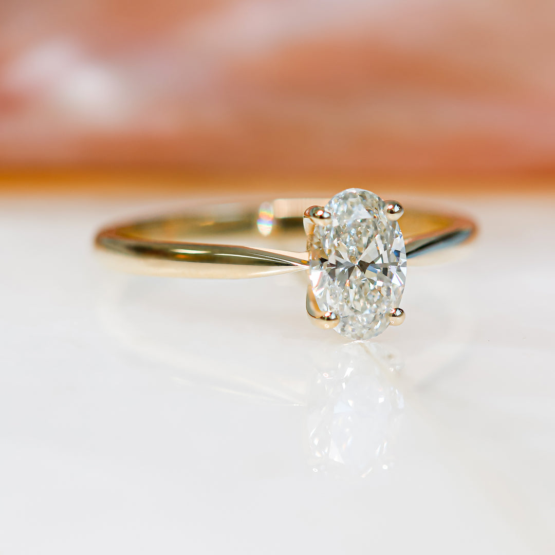 Descending Natural Oval  Diamond Engagement Ring