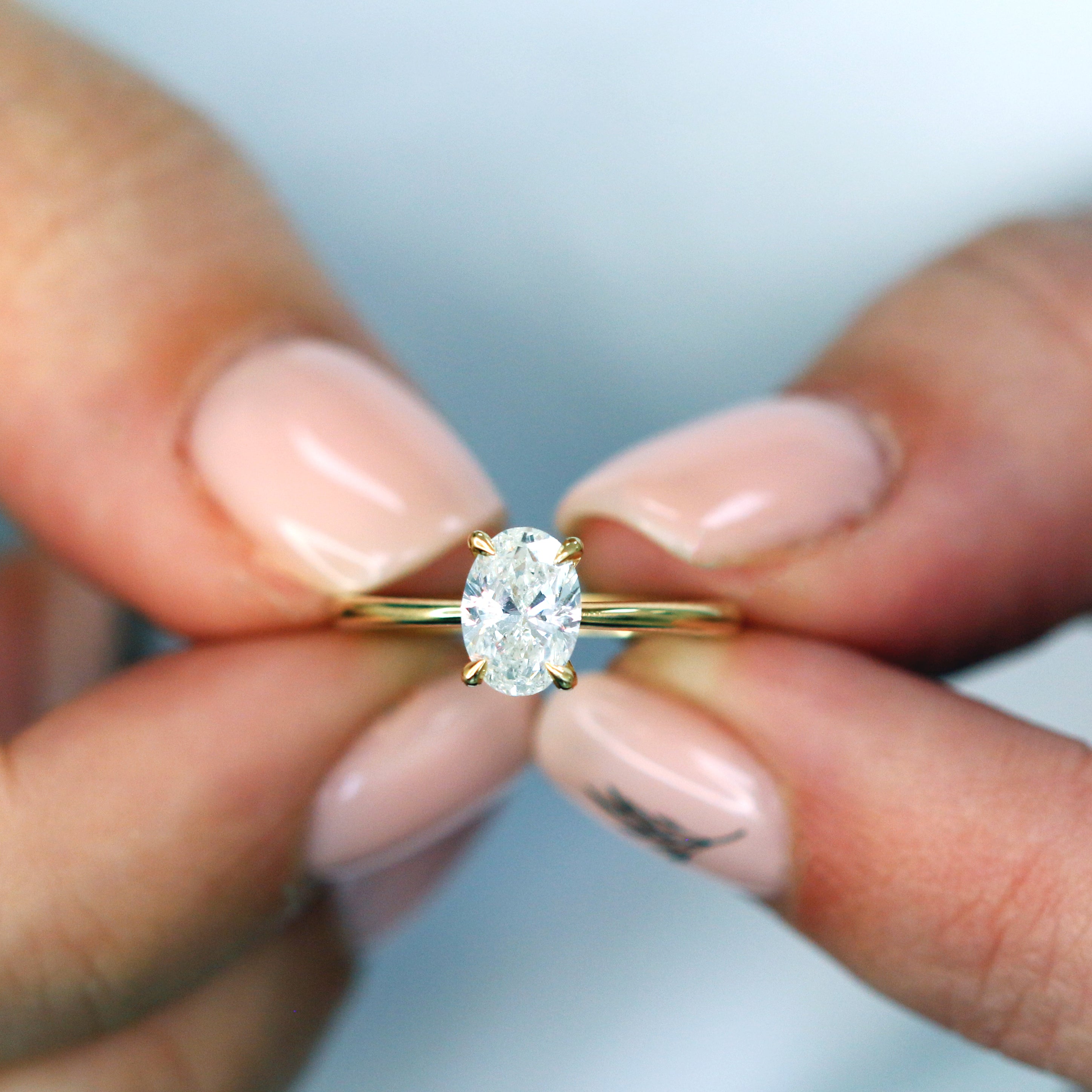1 Carat Claw Prongs Natural Oval Cut Diamond Engagement Ring